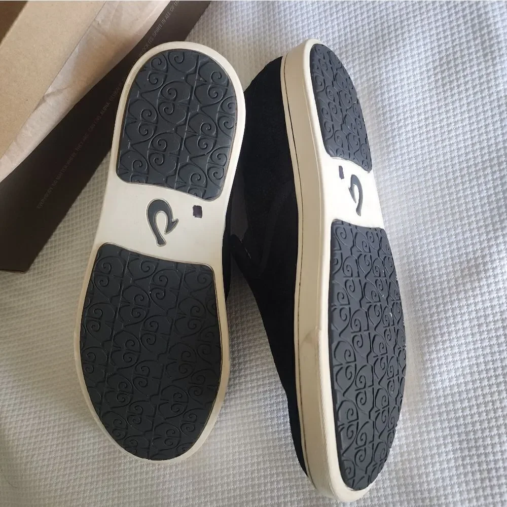 OluKai Black and White Flats Sleek Slip-On Design